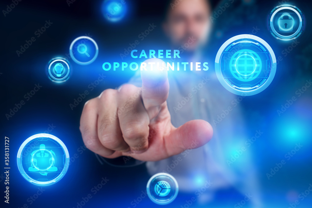 Business, Technology, Internet and network concept. Young businessman working on a virtual screen of the future and sees the inscription: Career opportunities Business, Technology, Internet and network concept. Young businessman working on a virtual screen of the future and sees the inscription: Career opportunities