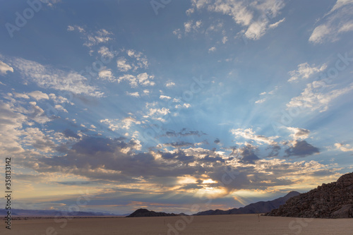 Sun rays through clouds in the morning Namib Desert