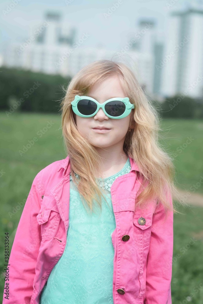 Portrait Of Smiling Girl In Sunglasses Portrait Of Smiling Girl In Sunglasses