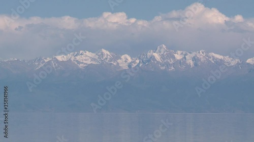 Kyrgyzstan Issyk-kul lake. Landscapes with cows.