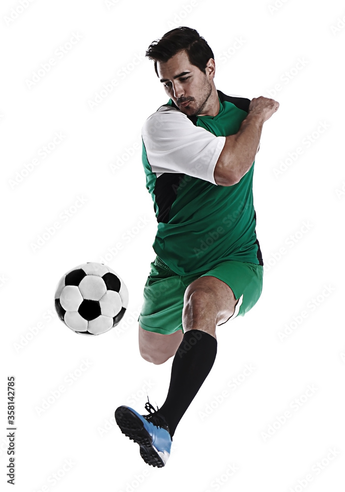 Young man playing football on white background