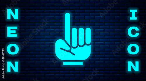 Glowing neon Number 1 one fan hand glove with finger raised icon isolated on brick wall background. Symbol of team support in competitions. Vector Illustration
