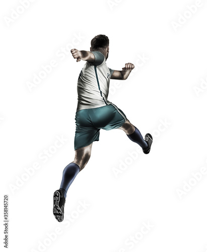 Young man playing football on white background