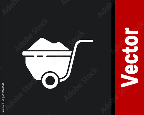 White Wheelbarrow with dirt icon isolated on black background. Tool equipment. Agriculture cart wheel farm. Vector Illustration