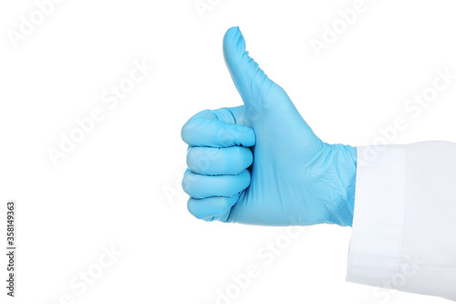 Doctor hand in glove showing thumb up on white background