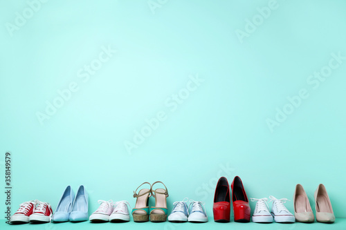 Different female shoes on mint background