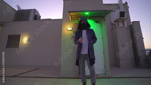 Lonely man on an post apocalyptic world walking on a rooftop
