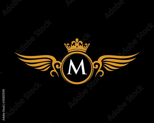 M letter initial with crown and exclusive crest