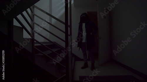 Lonely man on an post apocalyptic world walking on a staircase