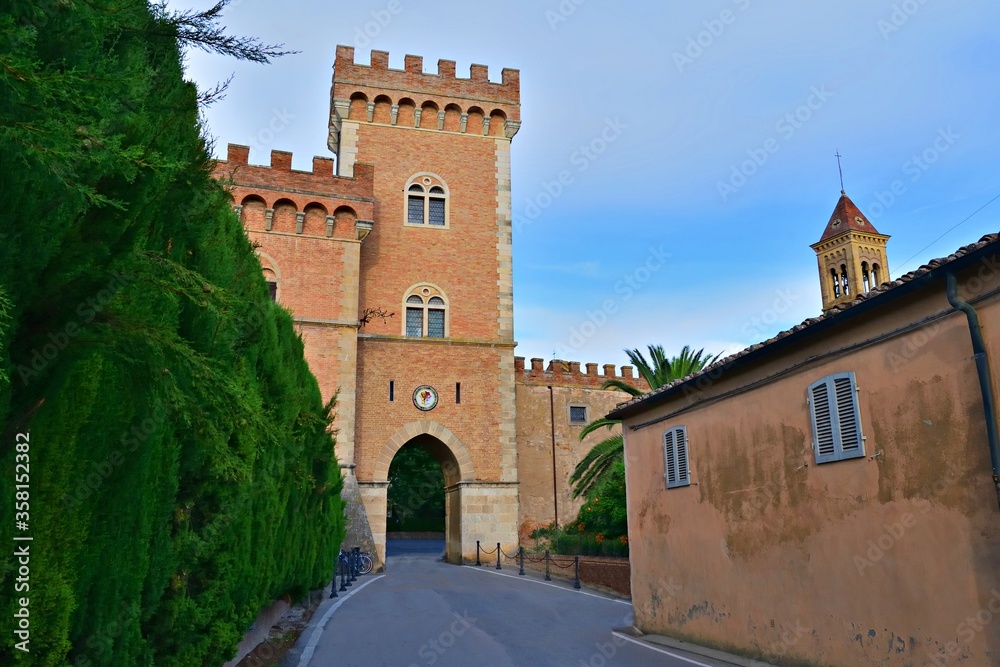 view of the Bolgheri castle of medieval origin which stands at the end of the famous Viale dei Cipressi in the town of Castagneto Carducci in Livorno, Tuscany, Italy.