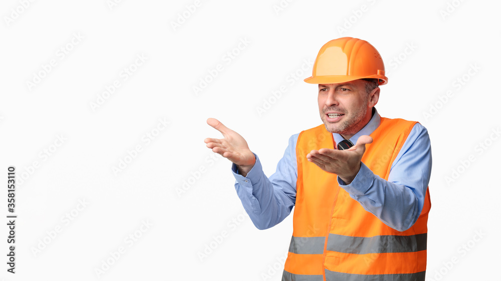 Discontented Construction Worker Gesturing Posing On White Background, Panorama Discontented Construction Worker Gesturing Posing On White Background, Panorama