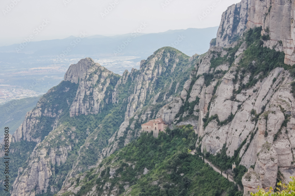 Spain. Catalonia - 30 AUGUST 2014. View from the top of the Montserrat Mountains and the Montserrat Monastery in the lower part