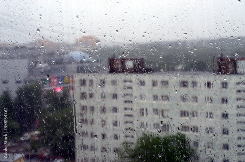 The city of rain through the glass