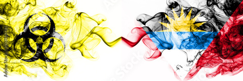 Antigua and Barbuda Quarantine. Coronavirus COVID-19 lockdown. Smoky mystic flag of Antigua and Barbuda with biohazard symbol placed side by side.