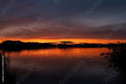 Sunset over the pond Rezabinec near Pisek town  Southern Bohemia  Czech Republic
