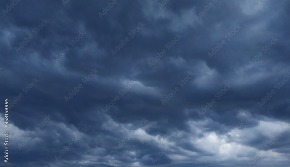 Blue and gray dramatic mammatus clouds