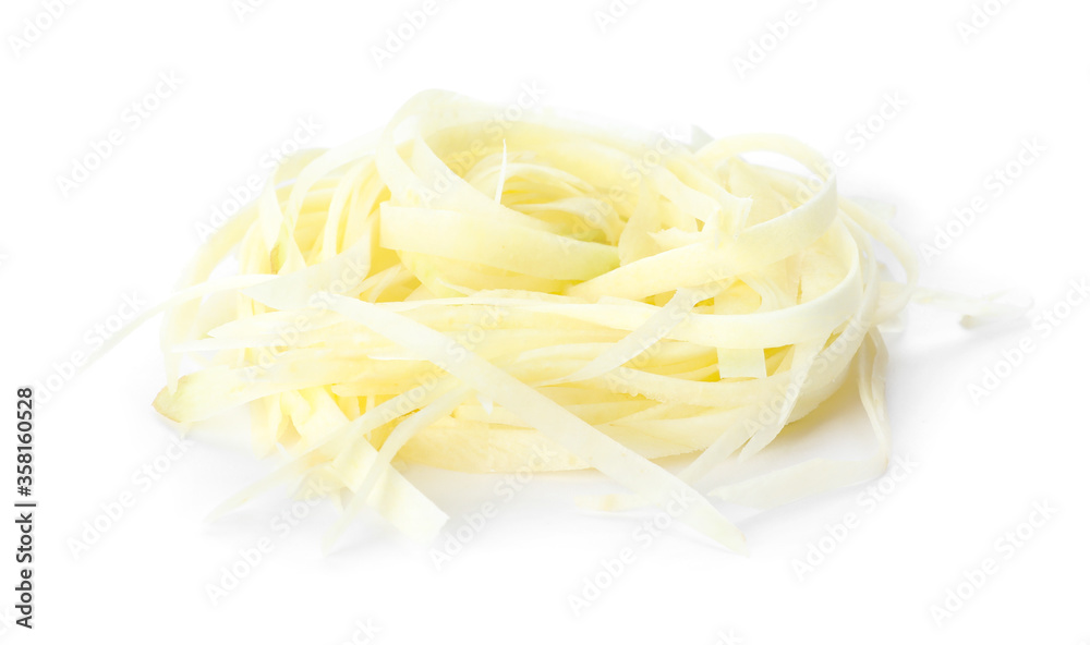 Tasty raw carrot noodles isolated on white Tasty raw carrot noodles isolated on white