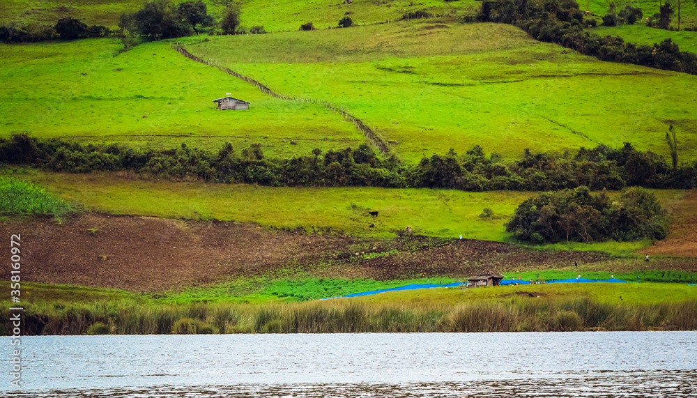 Landscape of rural areas and a lake in pomacochas, peru