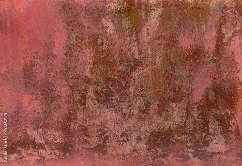 Pink rusty aged grained textured wall background.