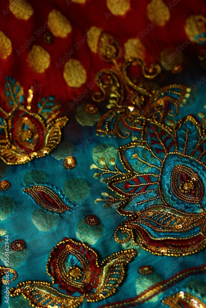 blue-red fabric with golden embroidery. Orient, Indian, Asian, Arabic style