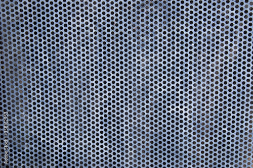 metal wall with holes
