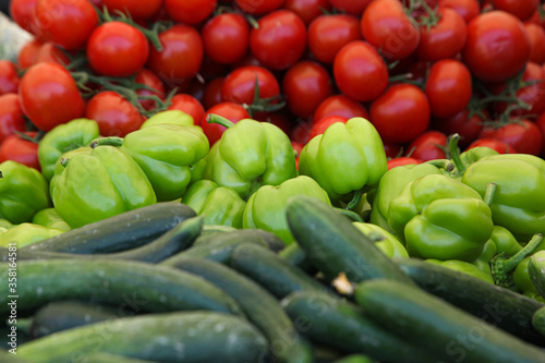 Fototapeta Naklejka Na Ścianę i Meble -  Tomatoes, green peppers and cucumbers in the grocery
