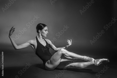 black and white vintage dramatic portrait of a dancing girl-ballerina