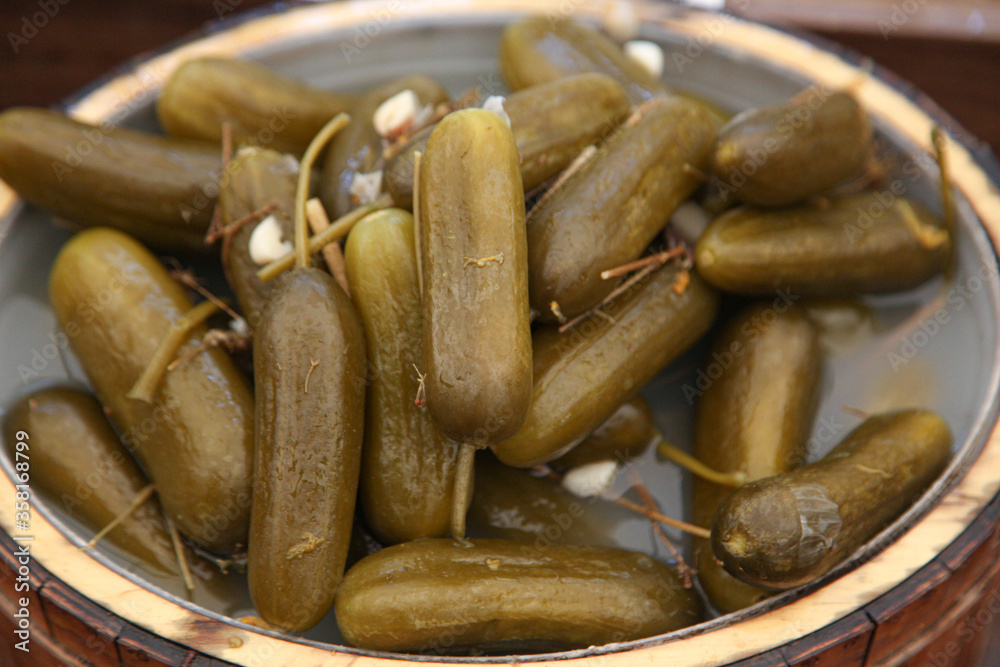 Marinated cucumbers and pickles in a metallic plate Marinated cucumbers and pickles in a metallic plate