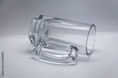 Beer mug, utensil or glass container similar to a glass but with handle, widely used to serve beer, drinks and liquids