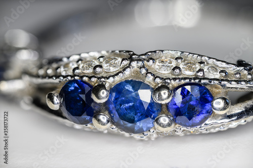 Blue sapphires in an engagement ring with zircons.