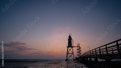 sunset on the pier - Lighthouse Obereversand - Wurster Nordseeküste