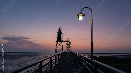 pier at sunset - Lighthouse Obereversand - Wurster Nordseeküste