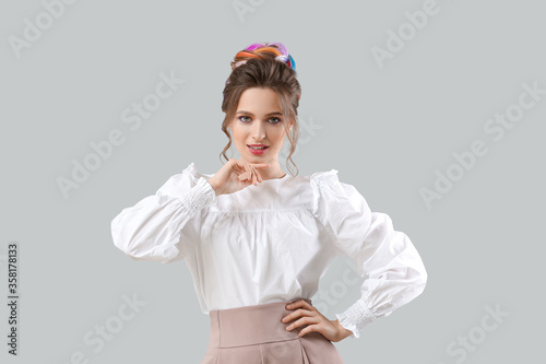 Beautiful young woman with ...