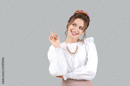 Beautiful young woman with ...
