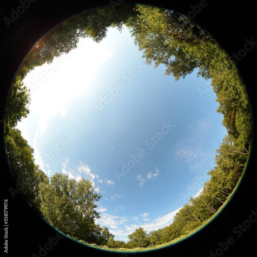 Around on Sky. Taken with a fisheye lens to give the special plate effect. The fresh air feel and clear blue sky are shown on the picture.