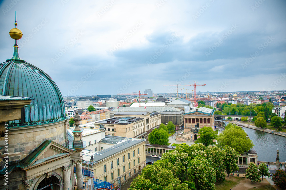 Obraz premium The Berlin cathedral and Fernsehturn television tower stand side by side as respected icons of the city. Perspective corrected panorama detailed when viewed large.