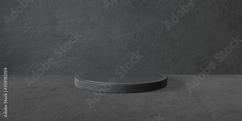 Espositore vuoto circolare grigio scuro su fondo grigio, podio o piedistallo per esposizione prodotti, base circolare con sfondo vuoto, Rendering 3D, visione frontale photo