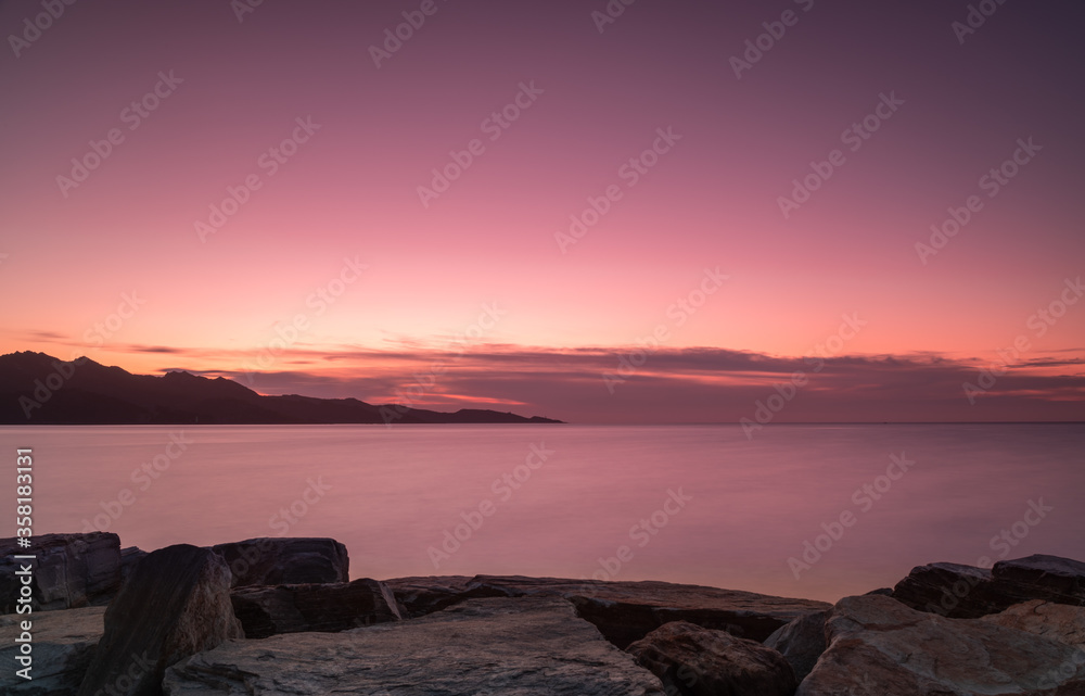 Romantic Pink Sunset in the Gulf of Saint Florent, Corsica.  Long exposure
