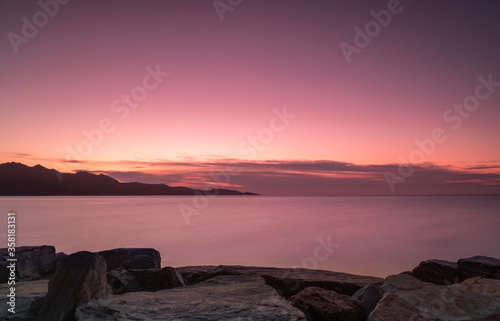 Romantic Pink Sunset in the Gulf of Saint Florent, Corsica. Long exposure