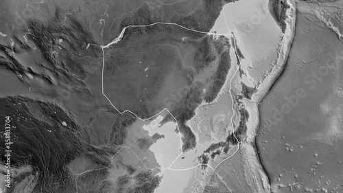 Amur tectonic plate - outlined. Grayscale photo