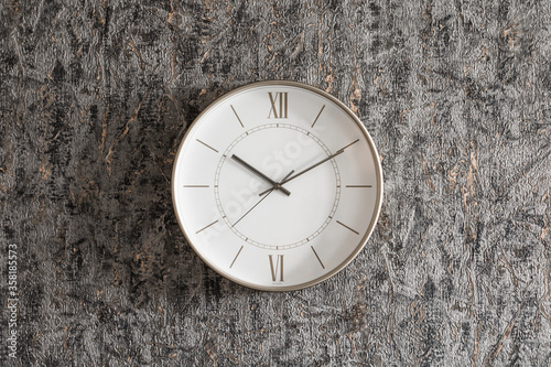 Wallpaper Mural Gold clock on the wall on a homogeneous background Torontodigital.ca