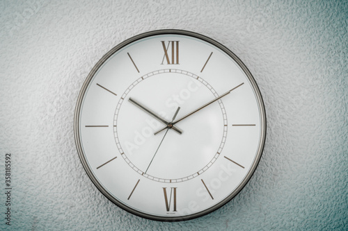 Wallpaper Mural Gold clock on the wall on a homogeneous background Torontodigital.ca