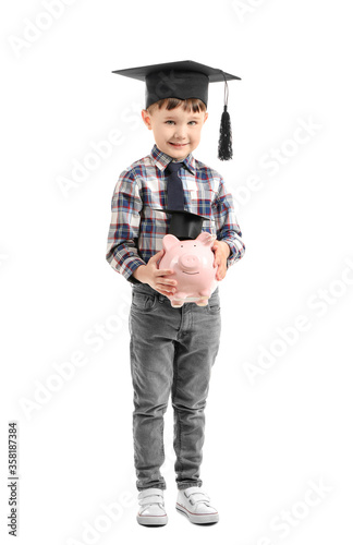 Little boy with piggy bank ...