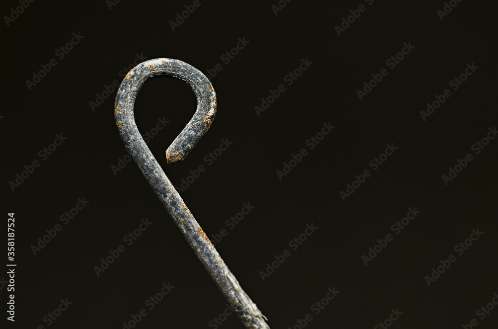 Rusty steel wire on black background. Macro photography with defocus Rusty steel wire on black background. Macro photography with defocus