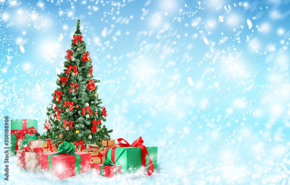 Beautiful Christmas tree with gifts under snowfall, space for text