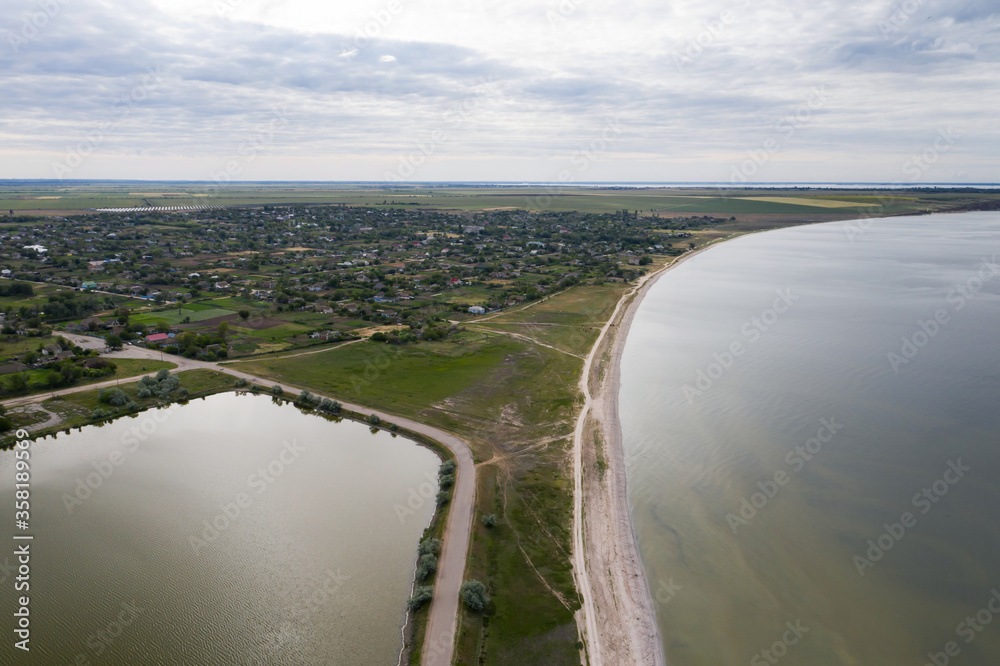 Beautiful aerial view of spit in river on cloudy day Beautiful aerial view of spit in river on cloudy day
