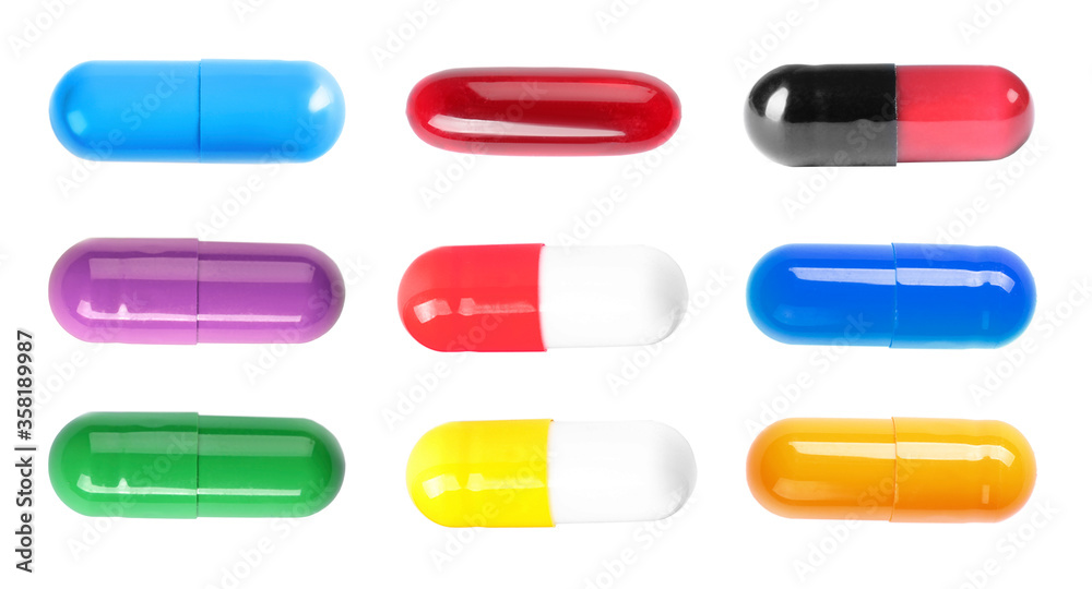 Set with colorful pills on white background, top view. Banner design Set with colorful pills on white background, top view. Banner design