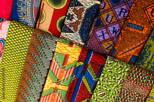 Traditional West African fabric for sale on the street outside a shop in Ghana, West Africa