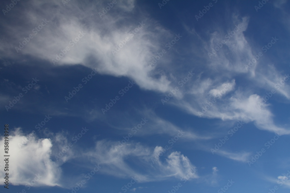 The vast blue sky and clouds sky. blue sky background with tiny clouds. The vast blue sky and clouds sky. blue sky background with tiny clouds.