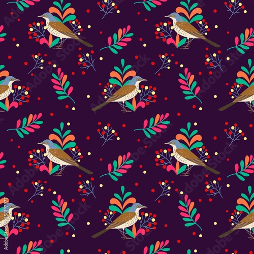 Seamless pattern with thrush birds and branches with berries. Vector illustration.